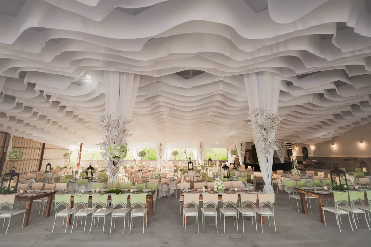 White draped wave ceiling reception